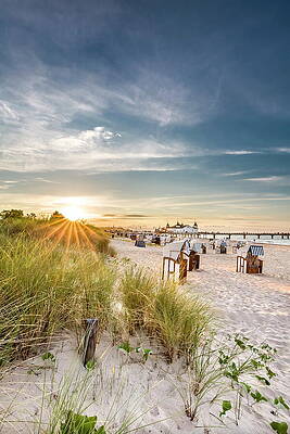 Atmospheric Wall Art featuring the digital art Roofed Wicker Beach Chairs And Pier On #1 by Sabine Lubenow
