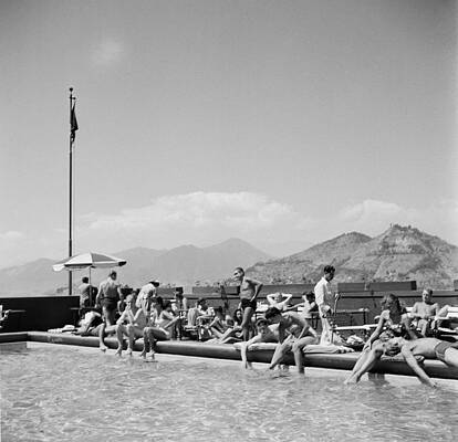 Poolside Relaxation with Mountain View Wall Art