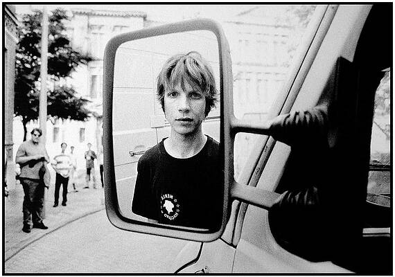 Reflection of a Youth in Mirror Wall Art