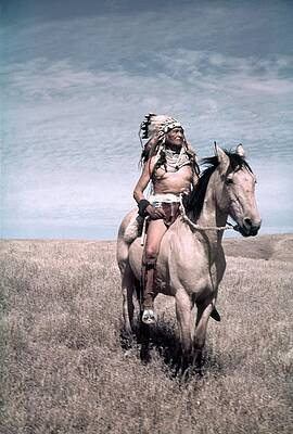 Chief in Traditional Headdress on Horseback Wall Art