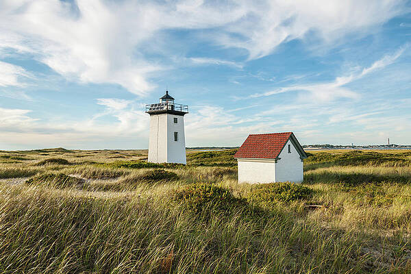 Lighthouse Amidst Coastal Dunes Wall Art