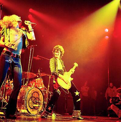 Energetic Rock Concert Performance Photograph