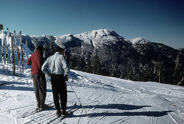 Skiers on a Snowy Mountain Slope Wall Art