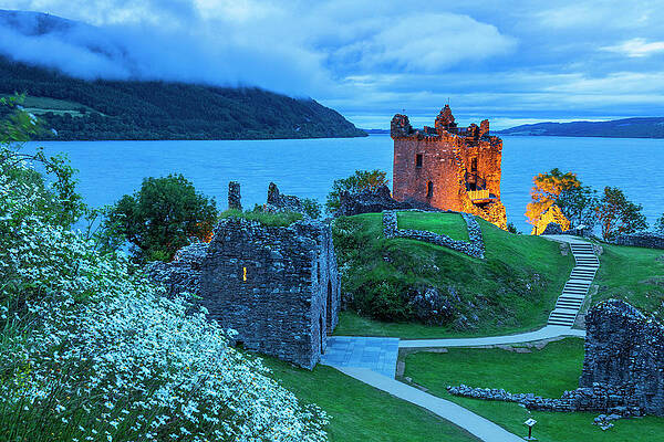British Wall Art featuring the digital art United Kingdom, Scotland, Loch Ness, Urquhart Castle, Great Britain, Highlands, British Isles, The Ruins Of The Castle And Its Majestic Tower Overlooking The Lake Illuminated At Night #2 by Luigi Vaccarella