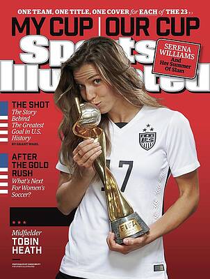 Tobin Heath Celebrates with Trophy Photograph