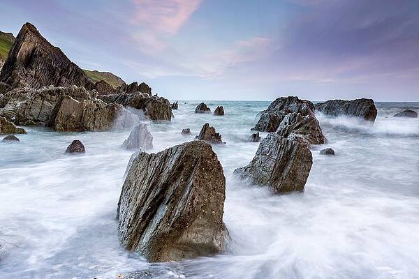 Radiant Wall Art featuring the digital art Coast With Rocks #3 by Sebastian Wasek