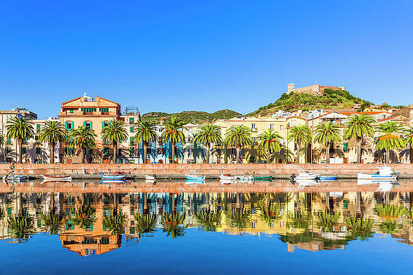 Wall Art featuring the digital art Italy, Sardinia, Oristano District, Mediterranean Sea, Bosa, Typical Colored Houses Along Temo River And Malaspina Castle In The Background. #3 by Marco Arduino