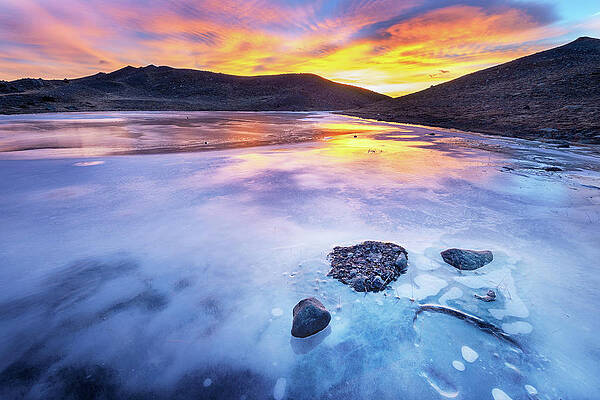 Wall Art featuring the photograph 3 Pebbles On Ice by Monamifoto