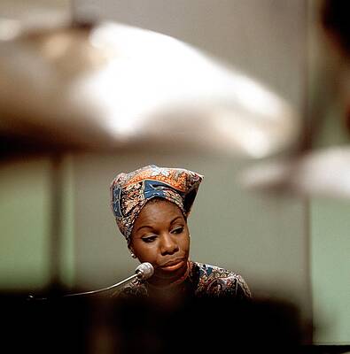 Iconic Pianist in a Colorful Headwrap Photograph