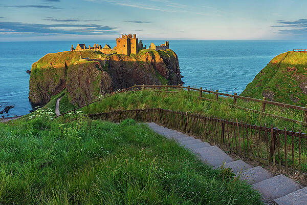 British Wall Art featuring the digital art United Kingdom, Scotland, Aberdeenshire, Stonehaven, Dunnottar Castle, Great Britain, British Isles, Warm Late Afternoon Light On The Ruins #4 by Luigi Vaccarella