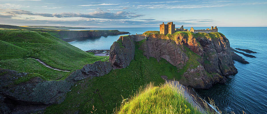 British Wall Art featuring the digital art United Kingdom, Scotland, Aberdeenshire, Stonehaven, Dunnottar Castle, Great Britain, British Isles, Warm Late Afternoon Light On The Ruins #5 by Luigi Vaccarella