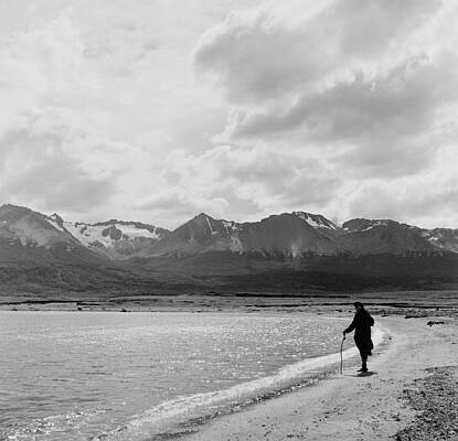 Solitary Figure on Mountainous Shoreline Wall Art