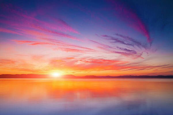 Dramatic Sunset Over Tranquil Waters Wall Art