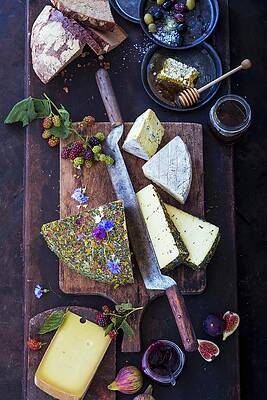 A Cheese Board With Various Cheeses Top View Print