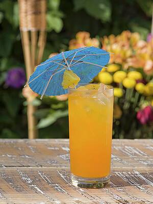 A Refreshing Fruit Cocktail With A Pineapple And A Paper Umbrella Print