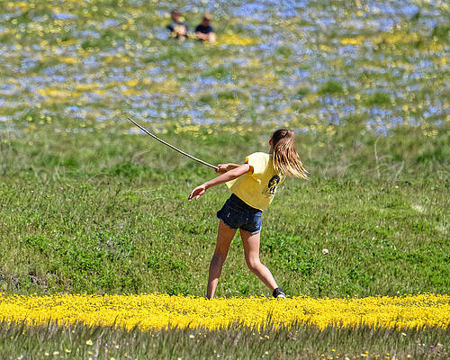 Vibrant Photograph - A Swing And A Miss -- Girl Playing In Flower Field In Santa Margarita, California by Darin Volpe