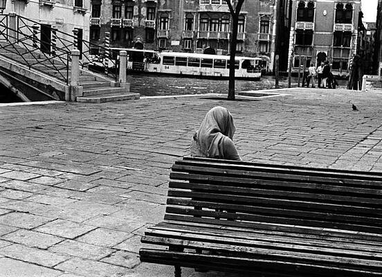 Wall Art featuring the photograph A Venetian Woman Alone In Venice, Italy by Elise Hardy