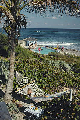 Relaxing on a Tropical Beach Hammock Wall Art
