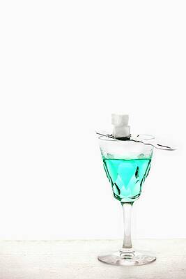 Absinthe With An Absinthe Spoon And Sugar Cubes In A Crystal Glass Print