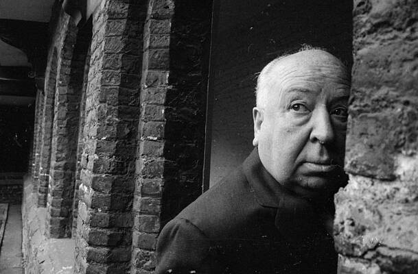 Man next to brick wall Wall Art