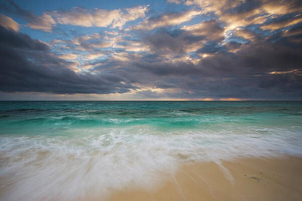 Clouds Over Tranquil Ocean Wall Art