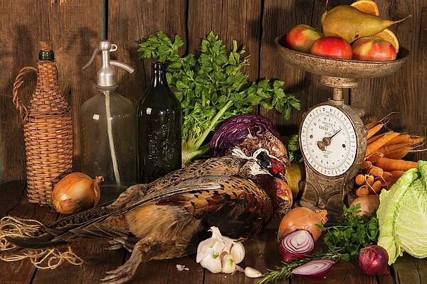 An Autumnal Arrangement Featuring Pheasant, Vegetables, Fruit, Nuts And An Old Pair Of Kitchen Scales Print