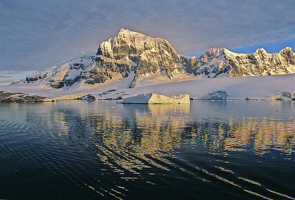 Paradise Wall Art featuring the digital art Antarctic Peninsula, A Sun Rising On The Mountain Around Paradise Harbor by Livio Piatta