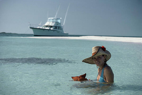 Woman Enjoying Ocean with Starfish Wall Art
