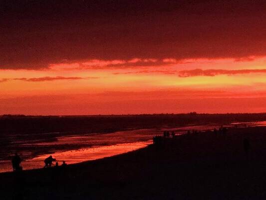 Wall Art featuring the photograph Blazing Sunset by Karen Stansberry