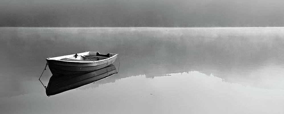 Solitary Rowboat on Misty Lake Wall Art