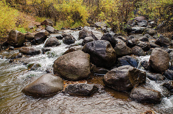 Wall Art featuring the photograph Boulders In Creek by Jeff Phillippi