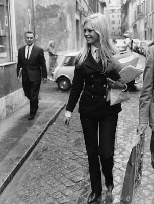 Brigitte Bardot Strolling in the City Wall Art