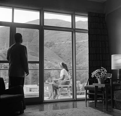 Contemplative Moment by the Balcony Wall Art