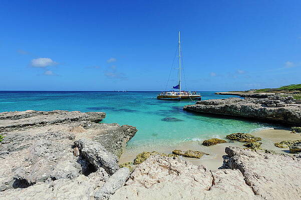 Caribbean Wall Art featuring the digital art Catamaran, Malmok Beach, Aruba by Werner Bertsch