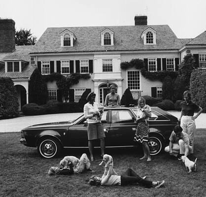 Family Gathering with Vintage Car Wall Art