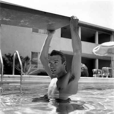 Man in Pool Holding Diving Board Wall Art