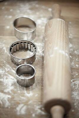 Cookie Cutters And A Rolling Pin On A Wooden Board Print