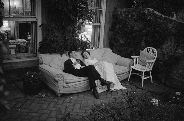 Bride and Groom Relaxing on Sofa Wall Art