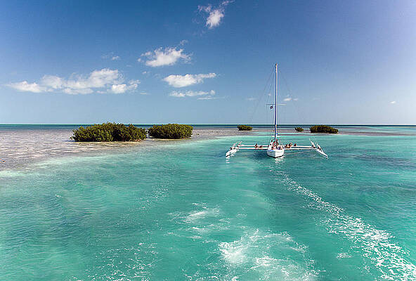 Caribbean Wall Art featuring the digital art Cuba, Caribbean, Cayo Largo, Sailing Near Capo Iguana by Bruno Cossa