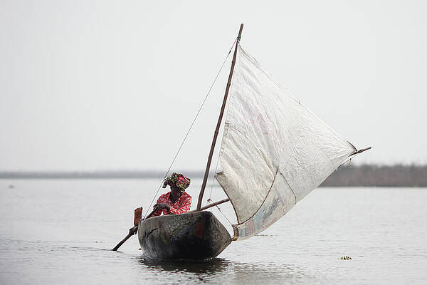 Wall Art featuring the photograph Daily Life In And Around Cotonou by Dan Kitwood