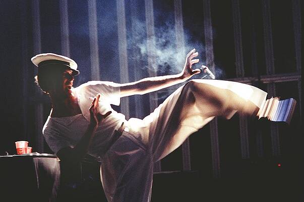 Dancer Performing a High Kick Wall Art