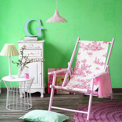 Deck Chair With Toile-de-jouy Fabric Seat In Front Of Green Wall Print