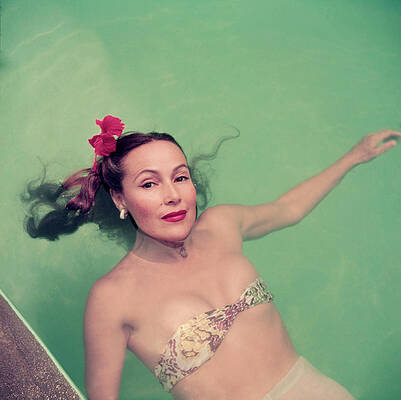 Woman Relaxing in a Pool Wall Art
