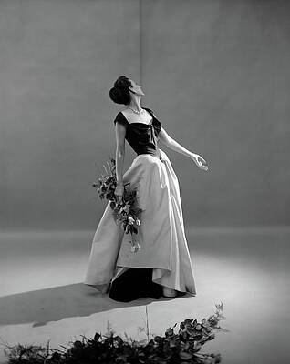 Wall Art featuring the photograph Dorian Leigh Wearing A Charles James Gown by Cecil Beaton