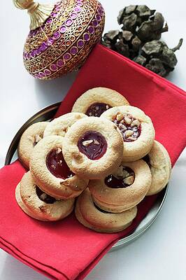 Food And Drink Photograph - Egg-yolk Macaroons With Blackcurrant Jam by Food Experts Group