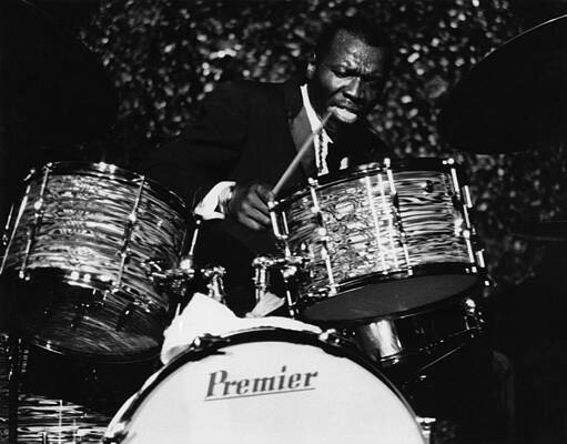 Renowned Jazz Drummer Performing Live Photograph
