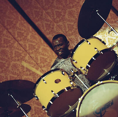Dynamic Drummer Performance Photograph