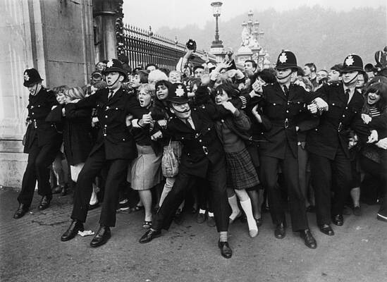 Police Holding Back a Crowd Wall Art