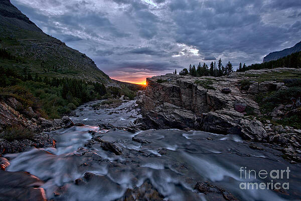 Wall Art featuring the photograph First Sunlight Over Swiftcurrent Falls by Adam Jewell
