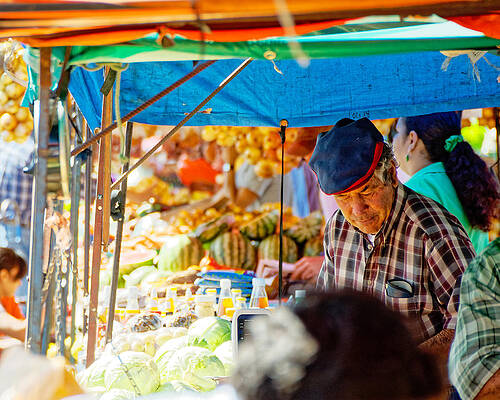 Vibrant Photograph - Feria Del Agricultor -- Vendor At A Farmers' Market In San Jose, Costa Rica by Darin Volpe